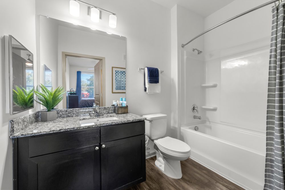 signature 1505 apartments near nc state university bathroom hardwood style flooring