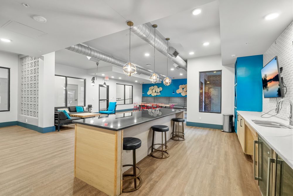 signature 1505 apartments near nc state university clubhouse kitchen and event space