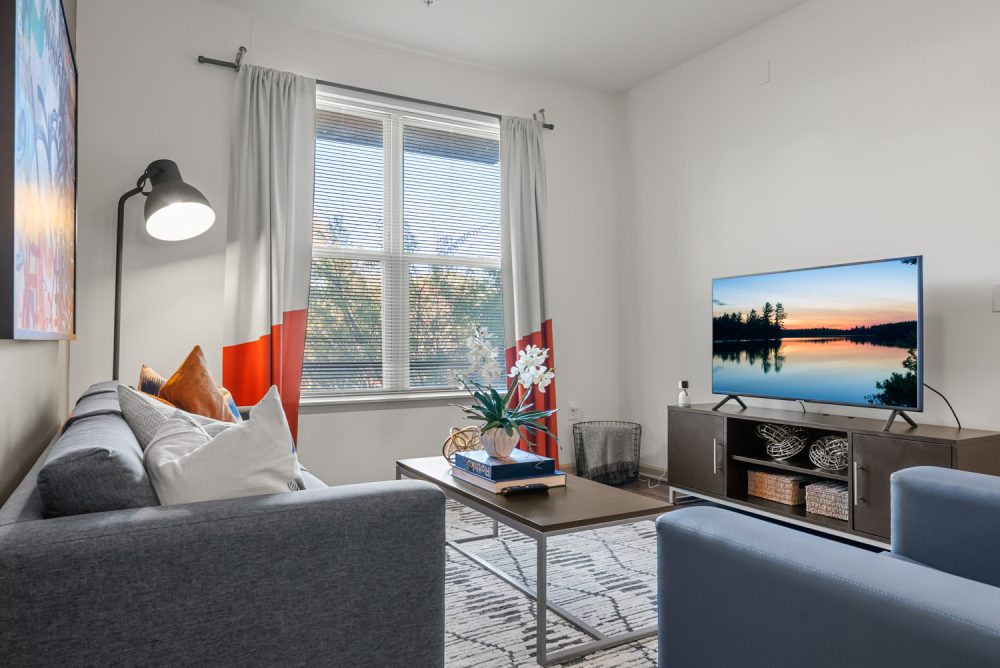 signature 1505 apartments near nc state university fully furnished living room smart tv