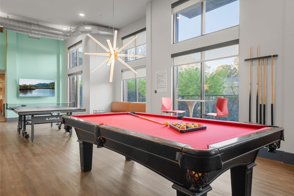 signature 1505 apartments near nc state university game room billiard table