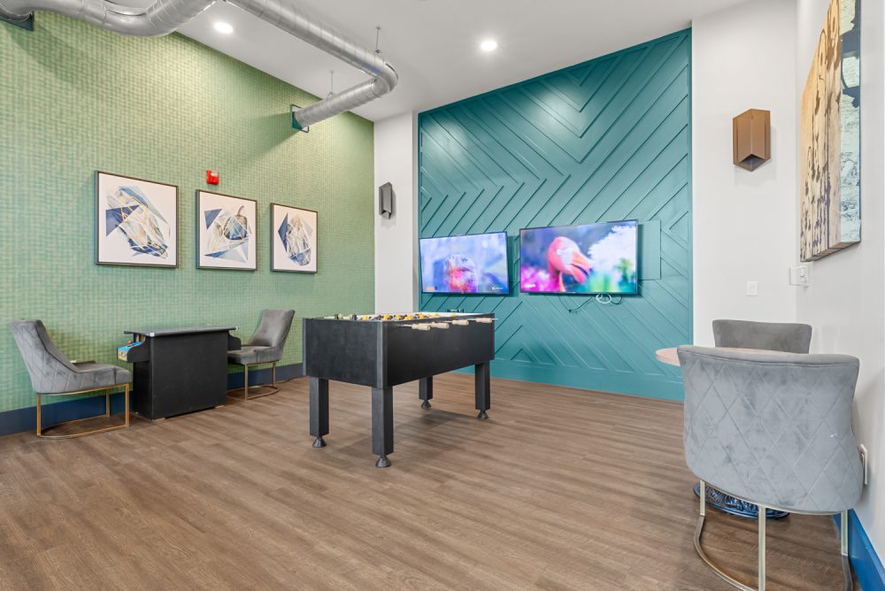 signature 1505 apartments near nc state university game room foosball table