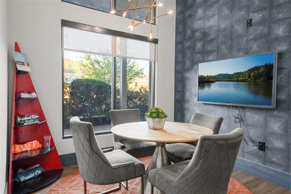 signature 1505 apartments near nc state university leasing office seating
