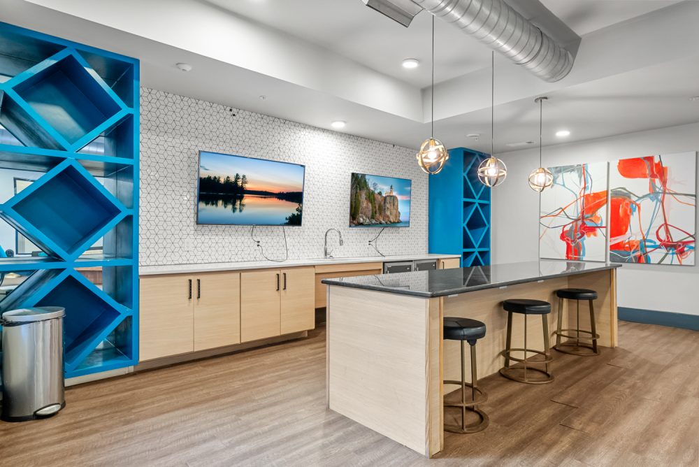 signature 1505 apartments near nc state university resident clubhouse kitchen
